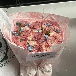 Detail of pink vintage bouquet with Just For You ribbon and floral paper wrap