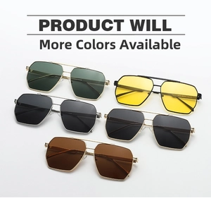 Detail view of double bridge aviator sunglasses in gold and silver metal frames