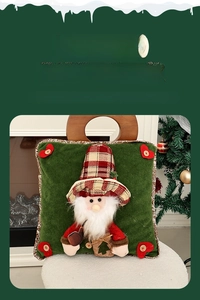 Detail of Christmas throw pillow with Santa plush, plaid trim, and wooden handle