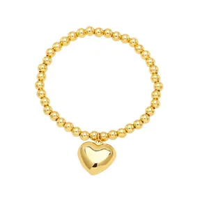 Polished 18k gold plated bead bracelet for women featuring a minimalist heart pendant