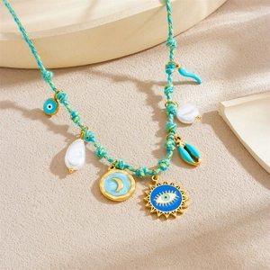 Bohemian braided rope necklace with sun eye, moon, and shell charms in gold finish