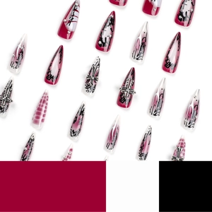 Gothic stiletto press-on nails with silver crosses and dark burgundy silver foil smudge