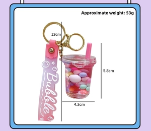 Pink bubble tea keychain with liquid sand, dimensions 5.8cm height by 4.3cm width