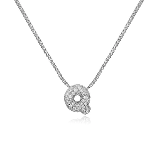Detail view of silver iced-out bubble letter Q pendant with cubic zirconia stones