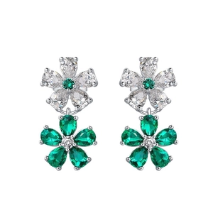 S925 silver flower stud earrings with emerald gemstones and white stones on white background
