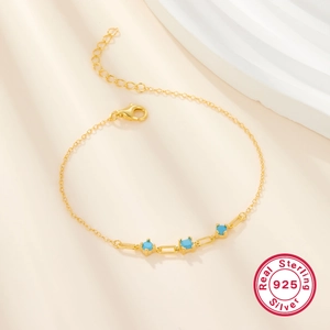 925 Sterling Silver gold bracelet featuring three square turquoise blue zircon stones