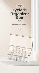 Detailed view of clear acrylic eyelash storage box with lid and dustproof compartments