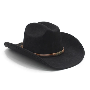 Detail of black cowboy hat with brown cord band and vintage copper metal accent