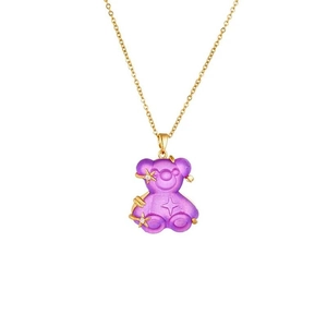 Detailed macro view of purple resin bear pendant with gold stars and micro zircons