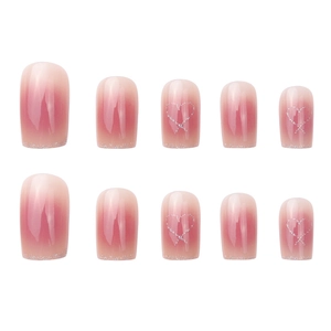 Short square pink ombre press-on nails with silver glitter hearts and glossy finish