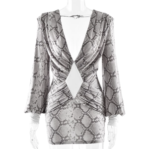 Bodycon snakeskin print mini dress with deep V-neck, lantern sleeves and waist cutout