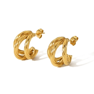 Elegant 18K gold plated titanium steel C-shape twisted hoop earrings on white background