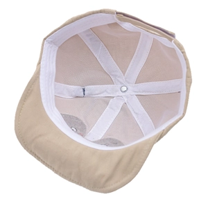 Inside view of a cute penguin baby baseball cap showing soft cotton lining and seams