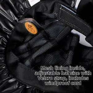 Detail view of breathable mesh lining and adjustable velcro strap on sun visor hat