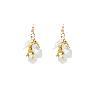 Detail view of gold dolphin charms and white pearl petal drop earrings for women