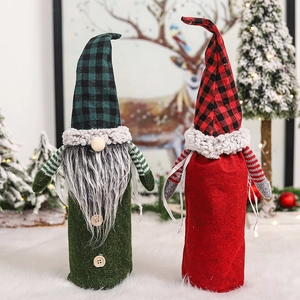 Nordic Christmas gnome wine bottle covers with red and green plaid hats for holiday decor