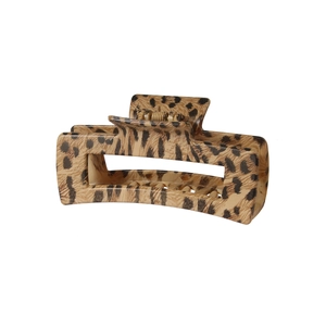 Close-up of leopard print hair claw clip featuring rectangular hollow design and spring