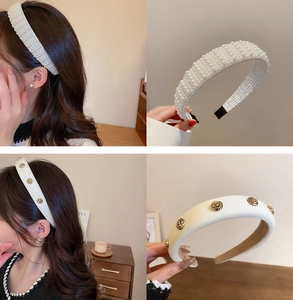 Detail of pearl headband and white fabric hairband with gold rose accents
