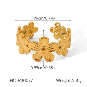 Detailed dimensions of gold flower ring showing 1.96cm width and 0.99cm height specs