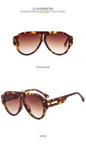 Detail view of oversized leopard print sunglasses with gradient tea lenses and gold metal trim