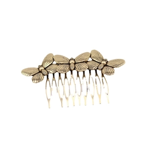 Vintage bronze hair comb featuring three detailed butterfly ornaments with seven-tooth grip