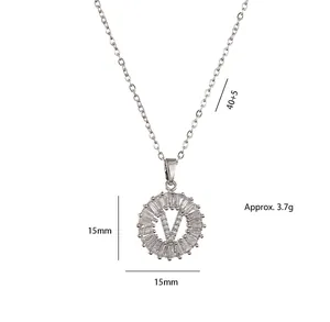 Silver round necklace with a V-letter pendant and baguette-cut zircons for women