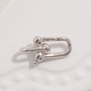 Macro shot of polished S925 sterling silver horseshoe U-link clasp for DIY jewelry making
