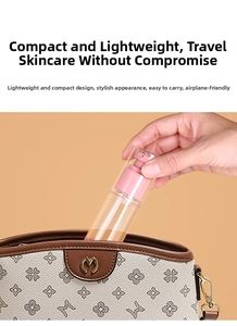 Travel size vacuum spray bottle being placed into a small bag for portable cosmetic storage