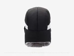 Rear view of winter trapper hat with windproof fabric and thick gray fleece lining