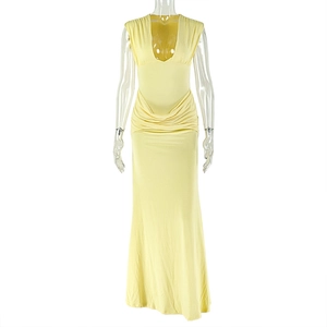 Detail of deep V-neck and horizontal ruching on a slim fit sleeveless yellow dress