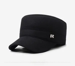 Detail of the black cadet cap featuring the R SPORT BEST metal logo and warm fabric