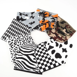 Assorted knit beanies featuring houndstooth, camouflage, and animal prints for winter warmth