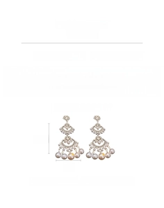 Detail showing tassel earrings with silver alloy base, rhinestones and faux pearls