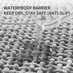Thick grey chenille bathroom mat with high water absorption and non-slip backing