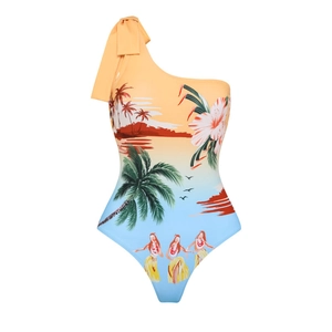 Detail of tropical sunset print bikini featuring palm trees and shoulder bow design