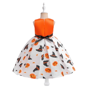 Back view of girl's Halloween pumpkin dress with orange satin and a black bow tie