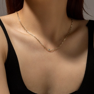 Elegant S925 silver gold chain necklace featuring a blue marquise gemstone pendant on model