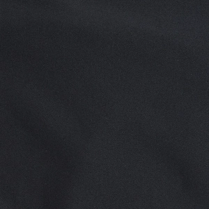 Macro detail of high-quality black knitted fabric texture showing premium fiber weave