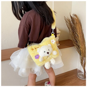 Detail of yellow plush kids crossbody bag with 3D teddy bear and Sweet embroidery