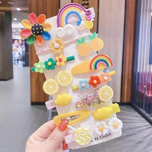 Close-up of 14 pieces colorful cartoon hair clips with rainbow and flower shapes