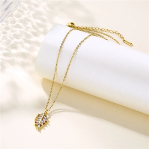 Elegant gold leaf necklace with zircon pendant on S925 silver chain and soft light