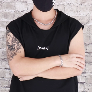 Men's silver oval titanium steel necklace and bracelet set in edgy punk style fashion