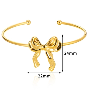 Bracelet jonc doré élégant pour femme avec un motif de nœud décoratif de 24 mm x 22 mm