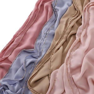 Solid color faux silk hijabs with gold bead chain trim in pink and blue colors