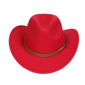 Detailed view of a red wool felt fedora featuring a brown leather band and gold buckle