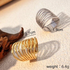 Adjustable wide open rings in gold and silver with multi-layer textured wave design
