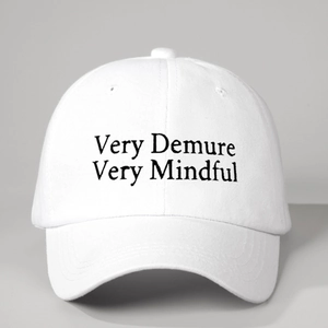 White cotton baseball cap with black Very Demure Very Mindful embroidery on front