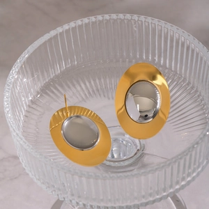 Two-tone geometric oval stud earrings in gold and silver, elegant titanium steel design