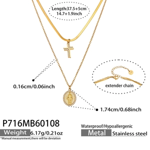 Detailed view of adjustable lobster clasp and extension chain on golden steel necklace