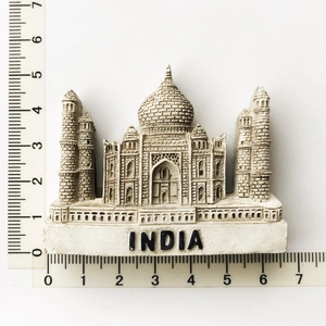 Detailed view of Taj Mahal resin fridge magnet with India text and scale measurement